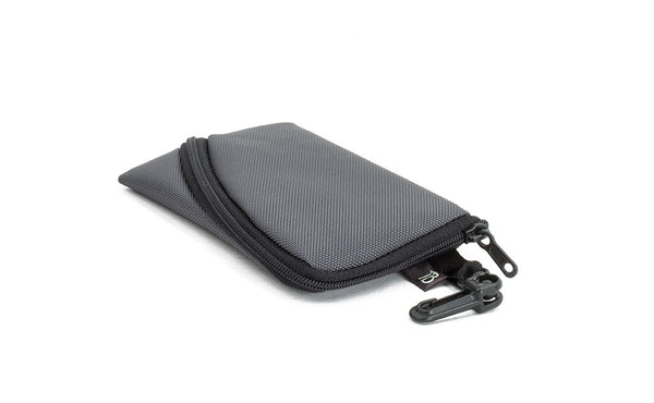 A Mini Ghost Whale Pouch in Nebulous Grey (dark grey).